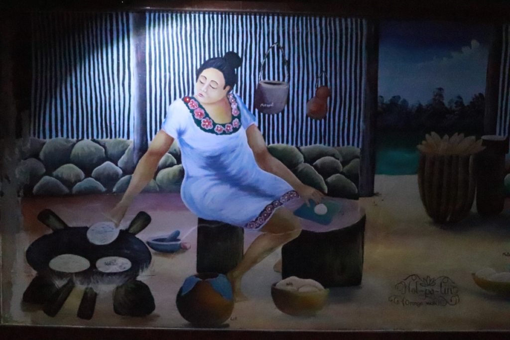 Muurschildering van vrouw Belize